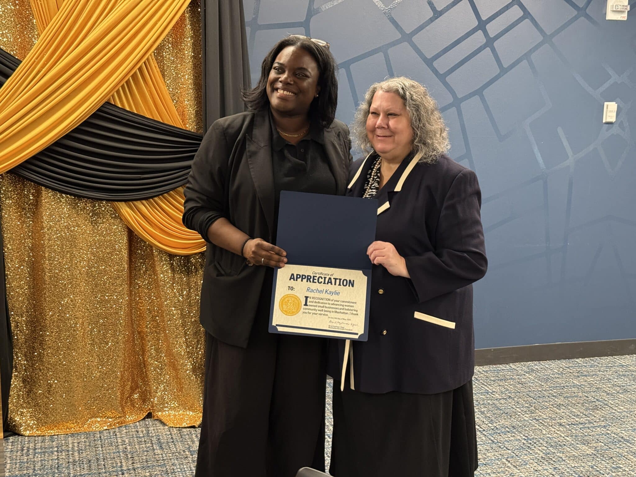 Rachel Kaylie receiving the Legal Excellence Award at the Gold Women's Health and Business Awards Gala, May 14, 2026